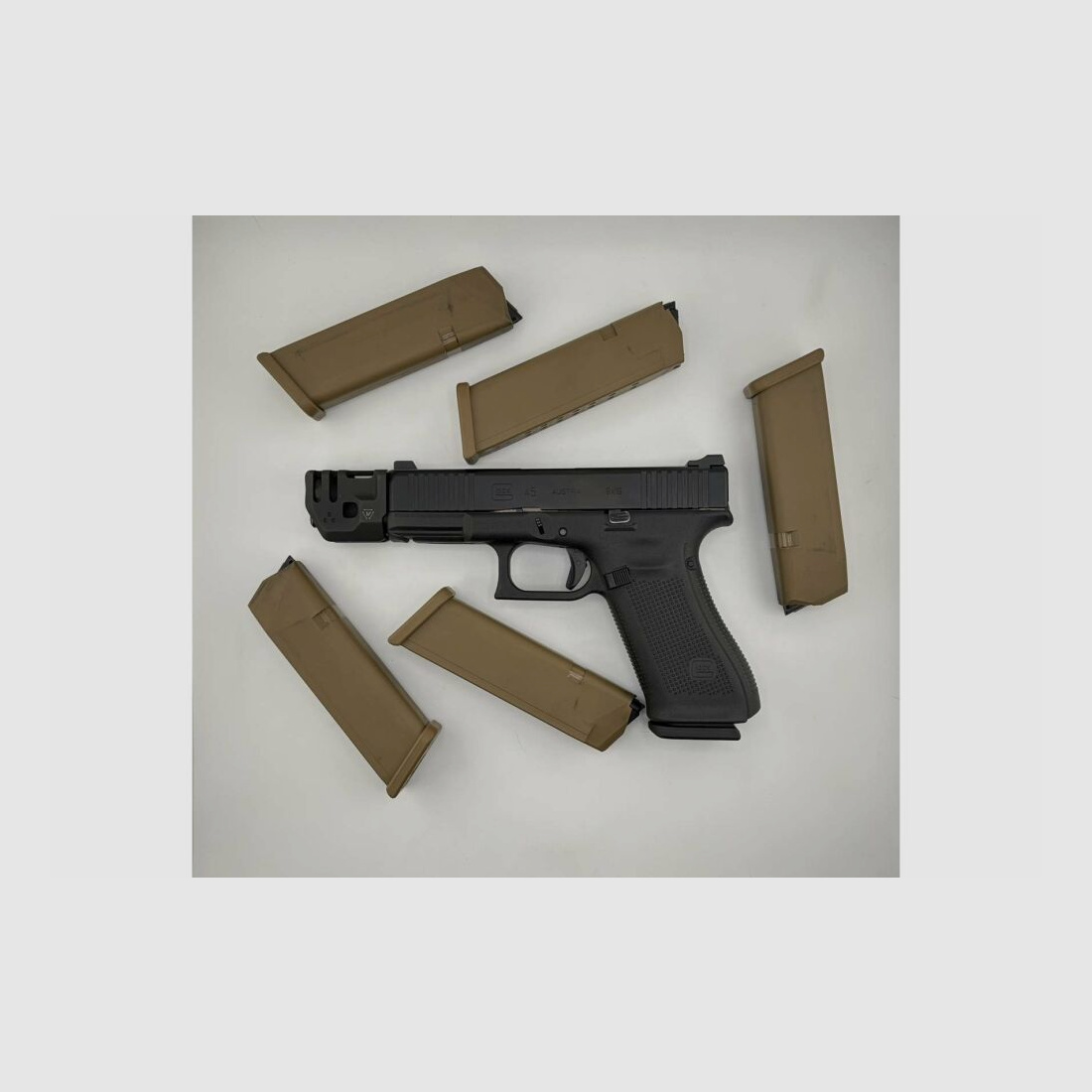 Glock 45 in 9x19 with removable Massdriver compensator from Strike Industries