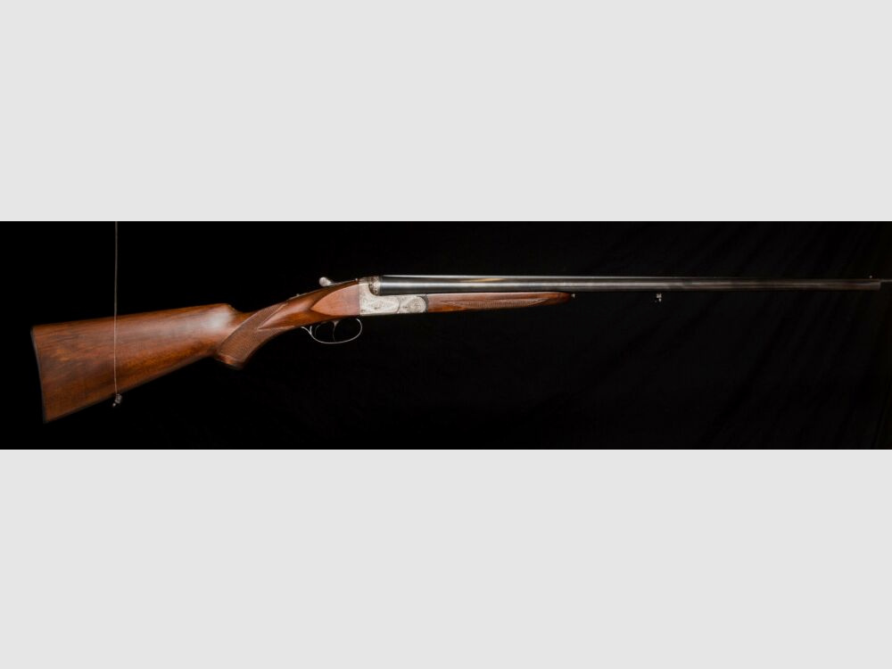 elegante Doppelflinte mit umfassender Gravur