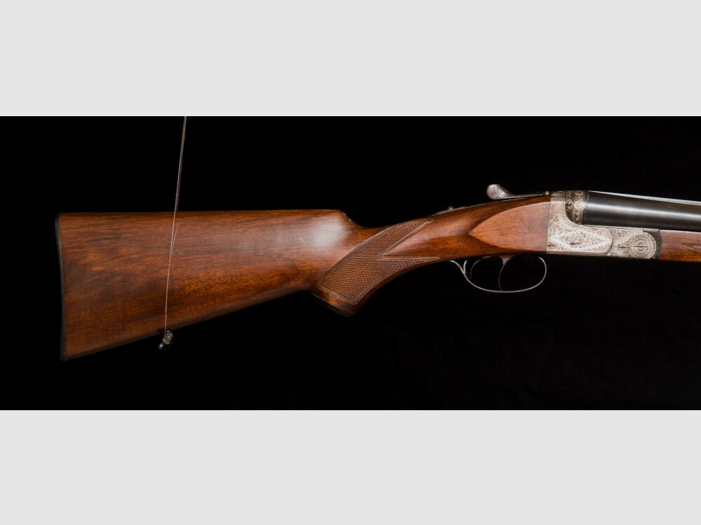 elegante Doppelflinte mit umfassender Gravur