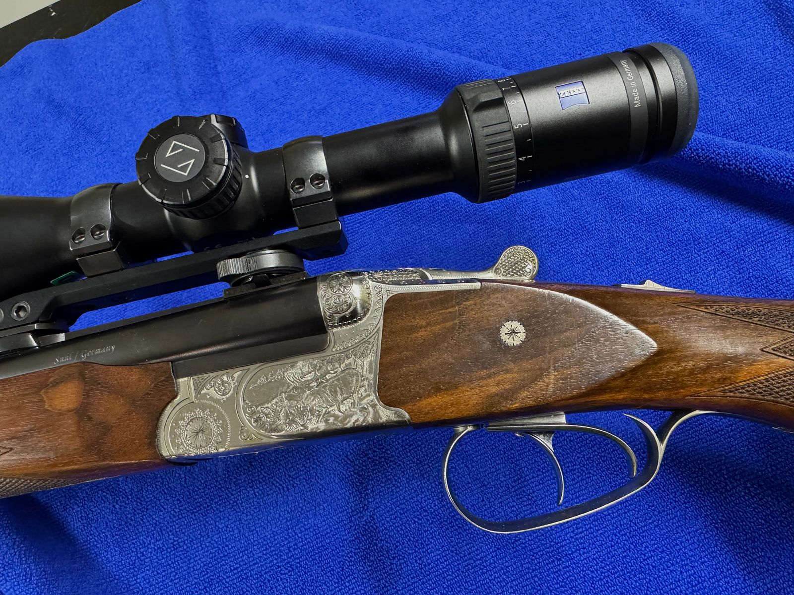 Merkel Doppelbüchsdrilling DR 961L con visor ZEISS Victory HT 3-12x56