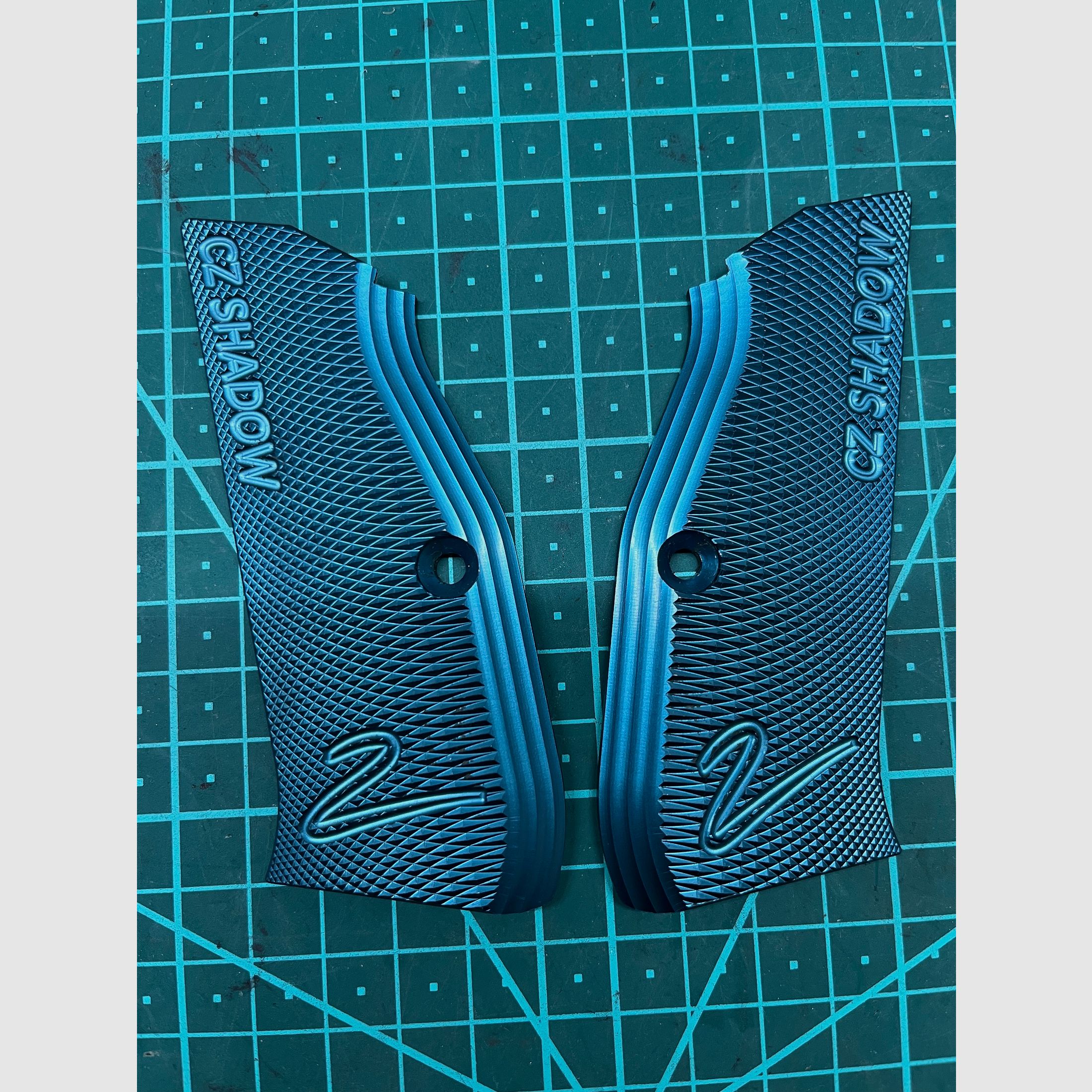 Shadow 2 grips blue anodized.
