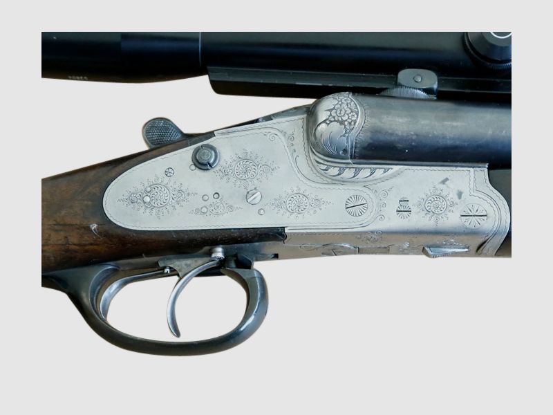 Suhl double-barreled drilling caliber 2x8x60R and 12/70 with interchangeable barrel caliber 2x12/70, 8x60R and ZF, additional