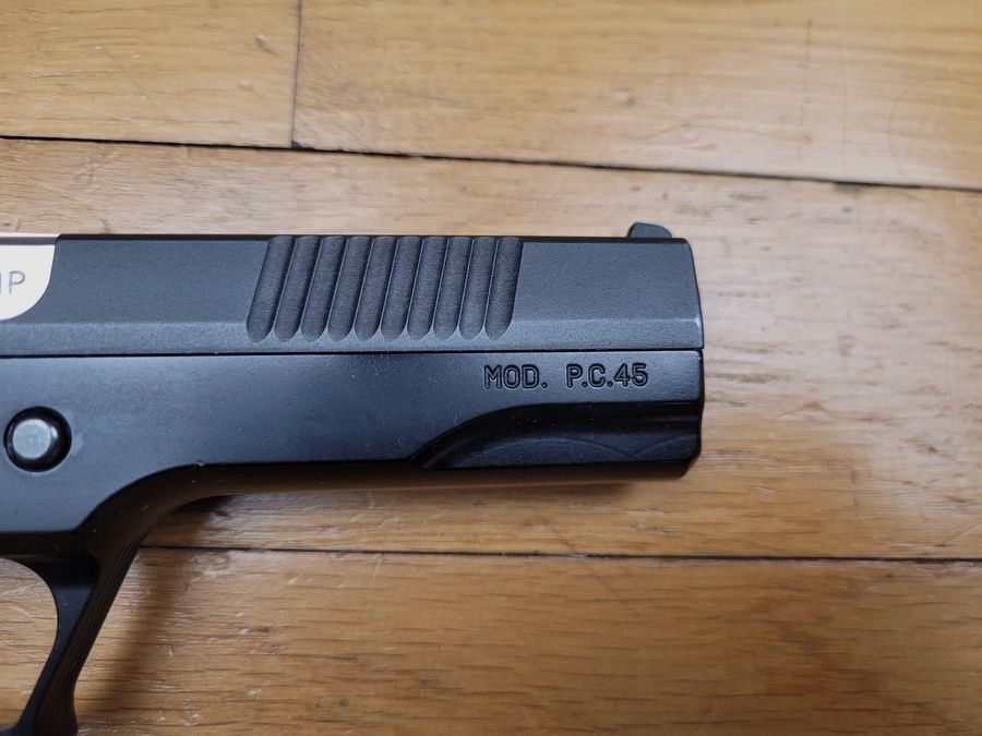 Very nice Pardini GT45 pistol – 45 ACP – Top alloy frame – 13-round double stack magazine – All controls ambidextrous – Low access slide stop – Petter locking – Pistol grip angled like Luger – Luxury and sport – Like new, image 20 of 20