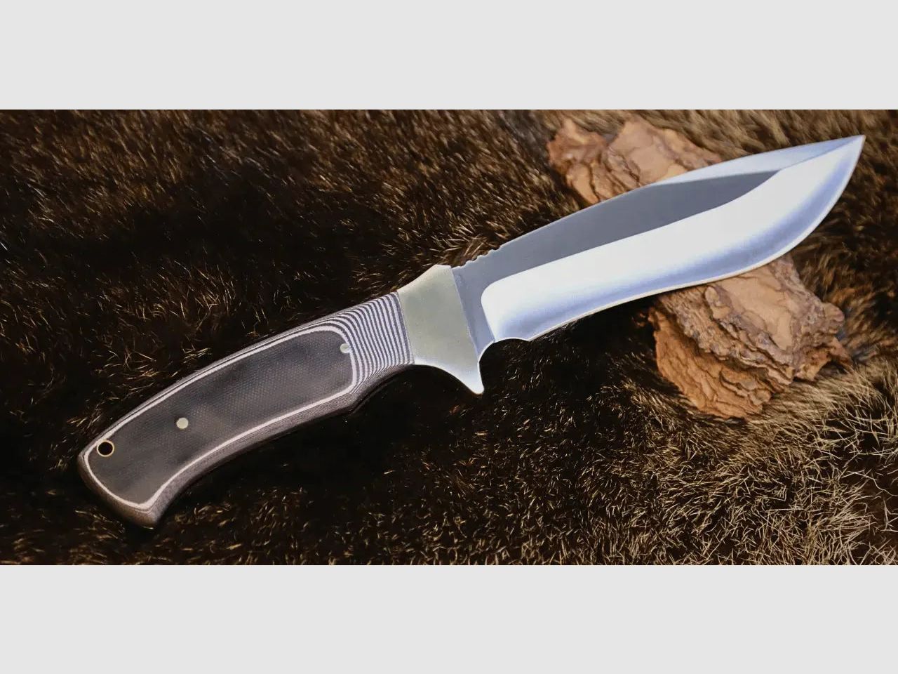 PUMA XP nomad z zapalnikiem, G10 czarny