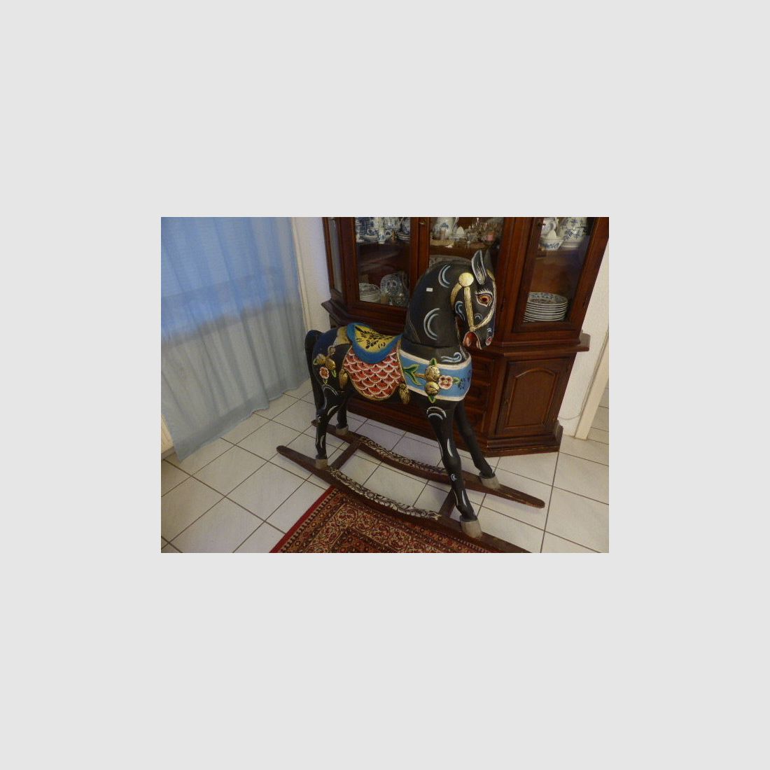 Maestro carpintero-artista	 caballo de madera