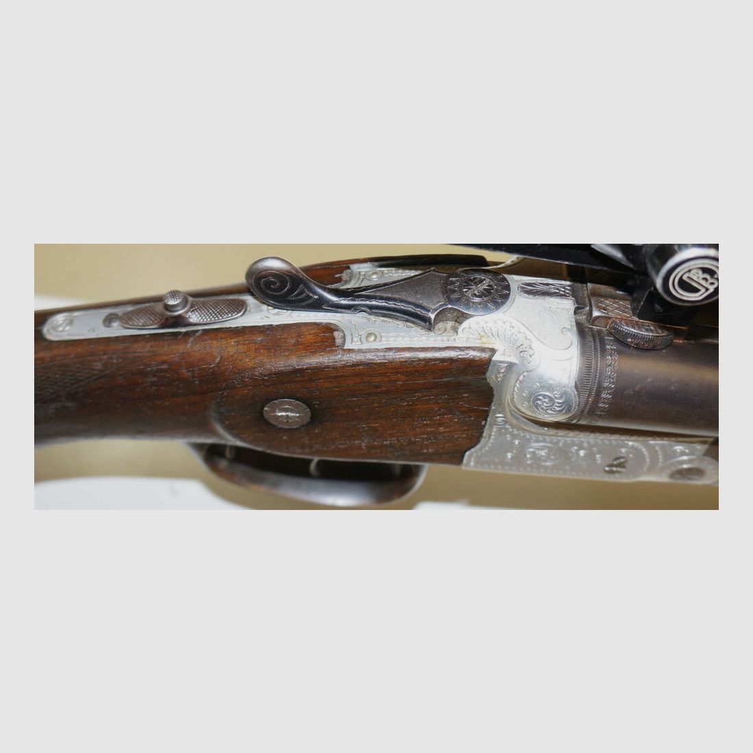 Krieghoff Drilling, Krieghoff, Kal.7x57R / Kal.16/70, mit GECO Zielfernrohr und schönen Gravuren