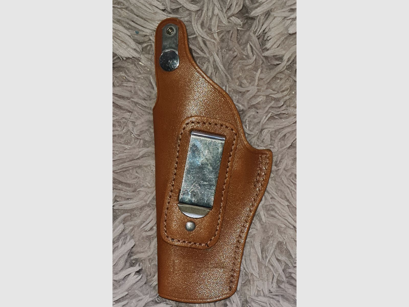 Funda de revólver, cuero