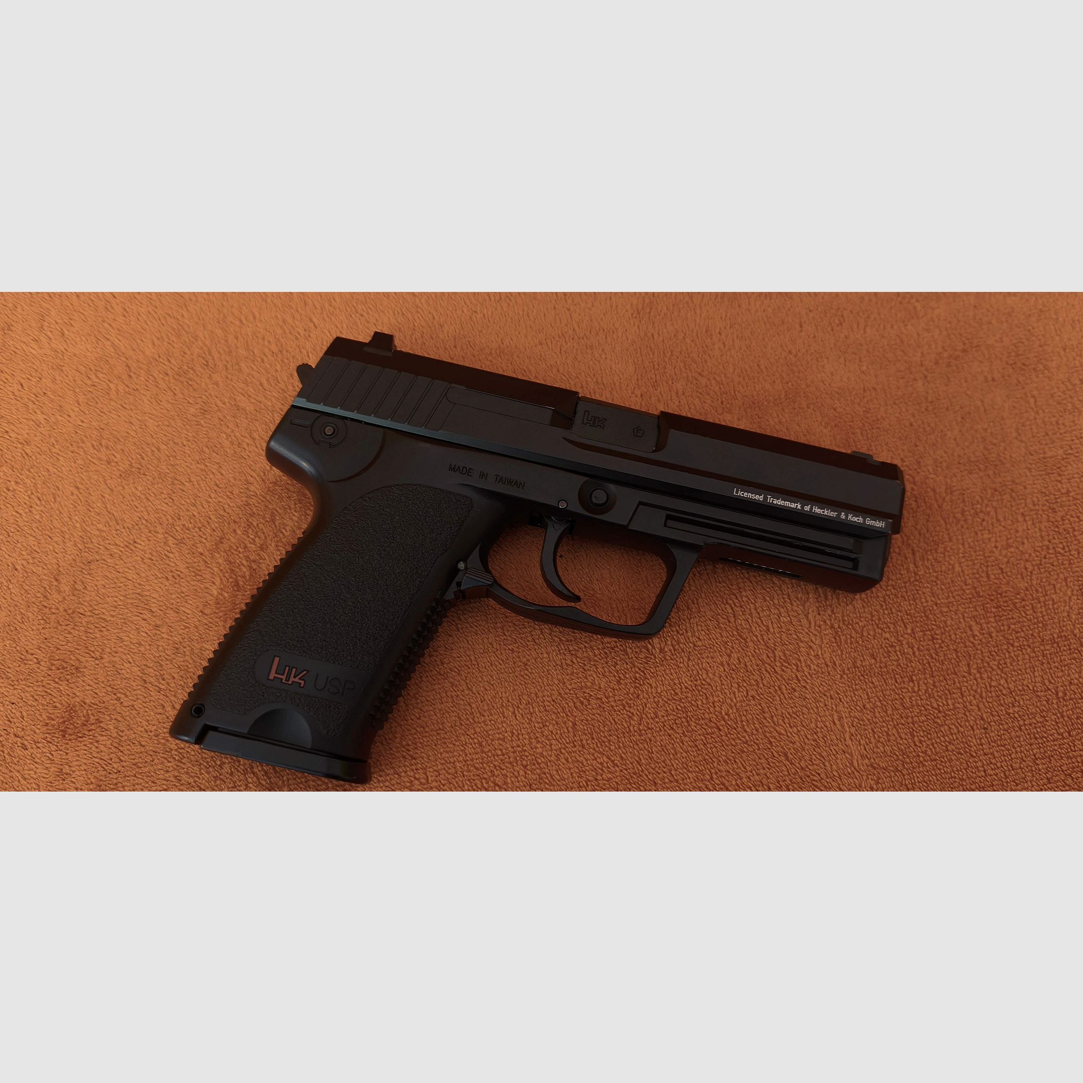 HK USP CO2 air pistol 4.5mm steel BB with signs of use