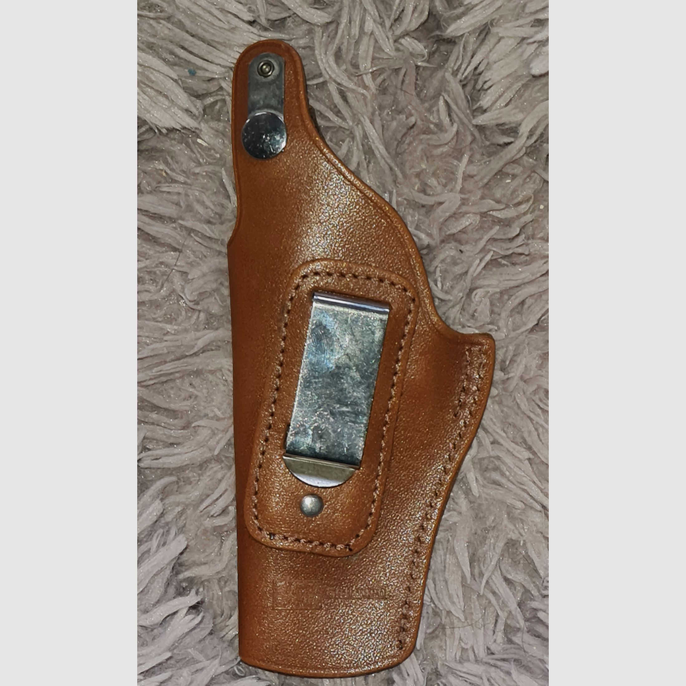 Funda de revólver, cuero