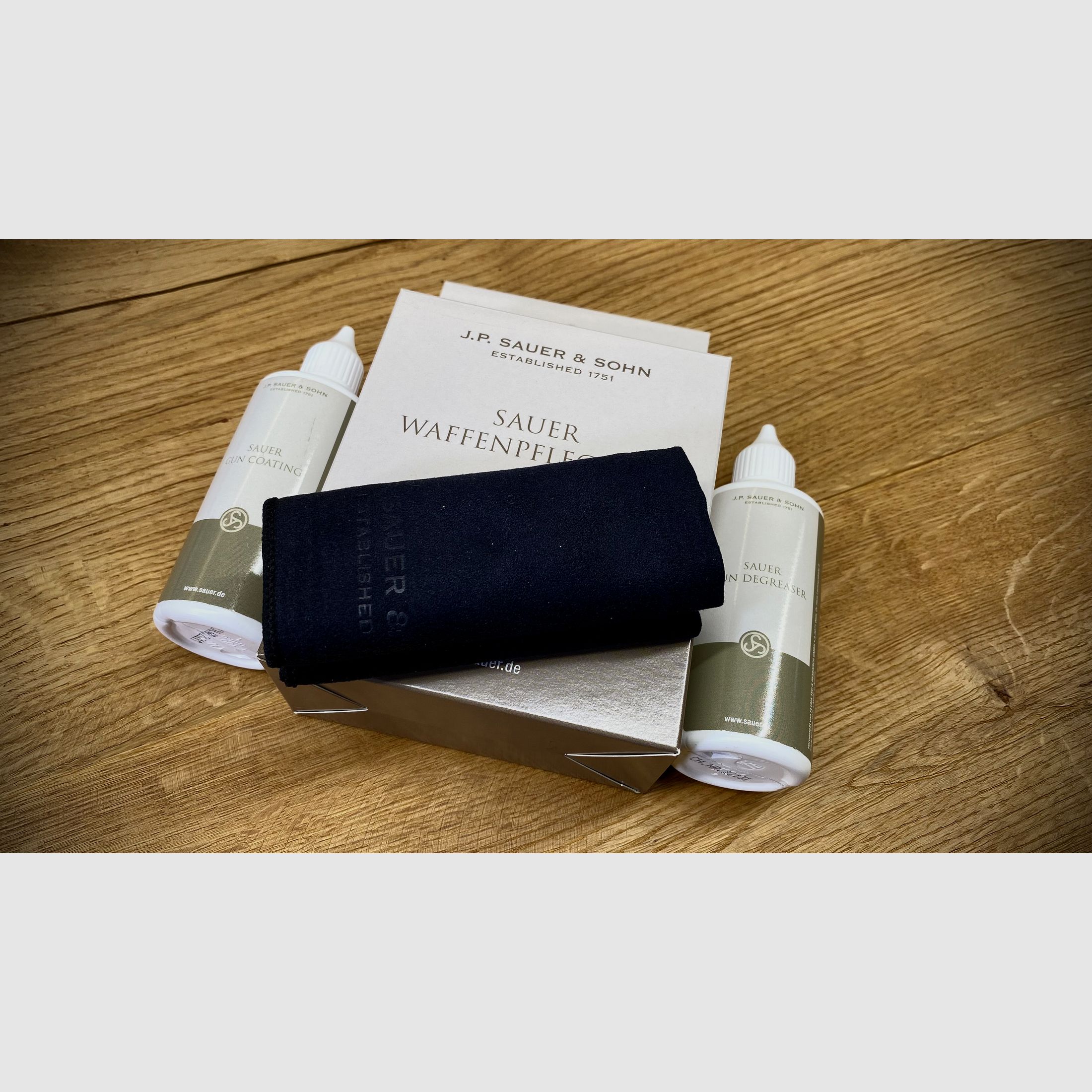 Selbstladeflinte Sauer SL5 Komplettset / Kaliber 12/76 / inkl. Koffer, Lederriemen, Reinigungsset und Sauer Cap 