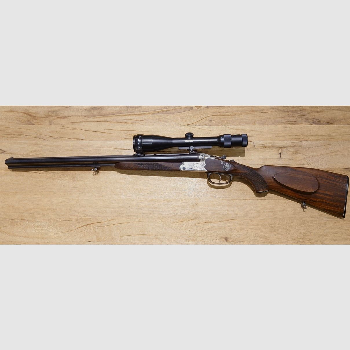 Drilling Sauer und Sohn Eckernförde Mod.3000 Duralux Kal. 7X57R; 16/70 Docter 2,5-10x48 Abs. 4