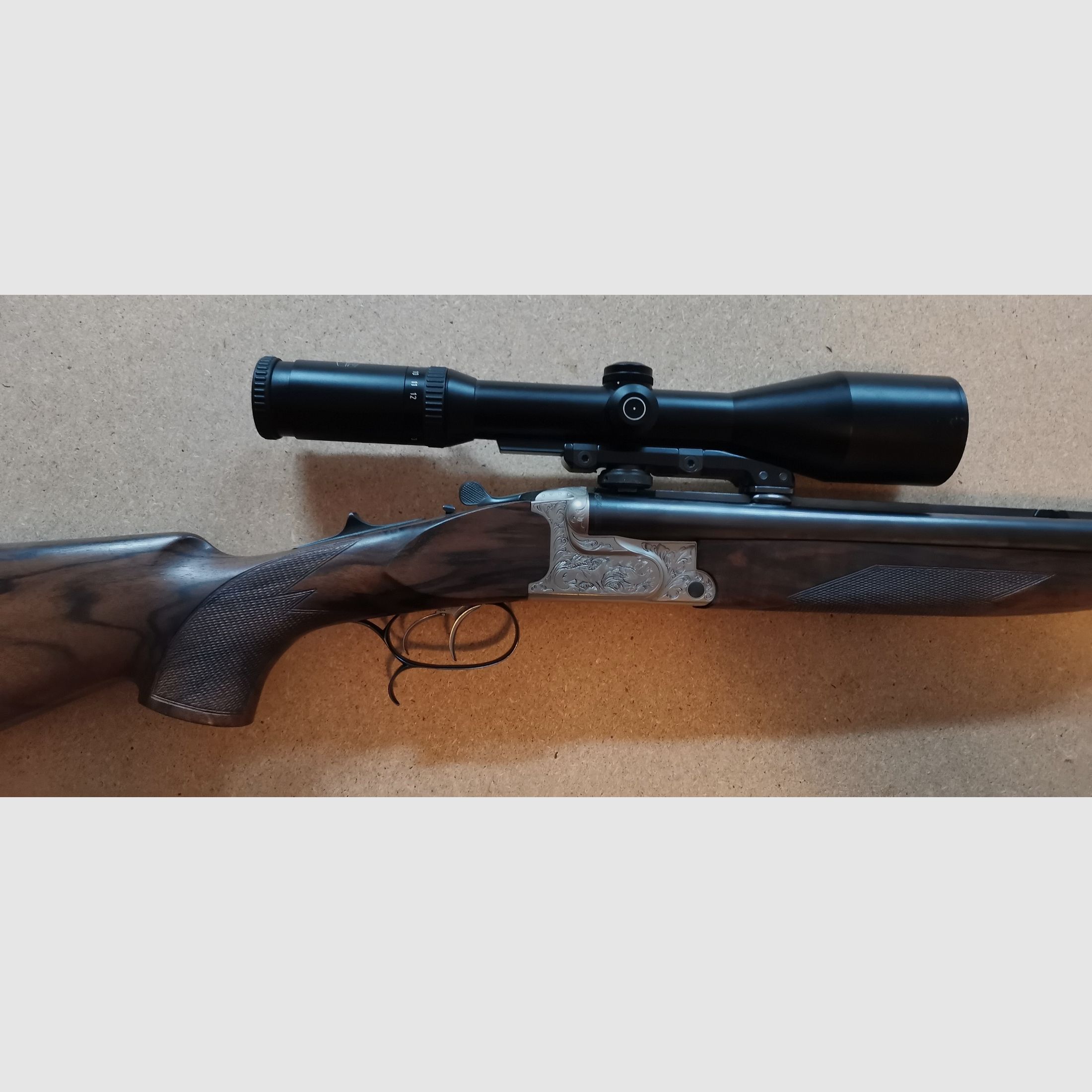 Boring Krieghoff Plus 20, 9,3 x 74R, 20/76 met EL 65, 5,6x 52R, handspanner, S&B LP 3-12 x 50