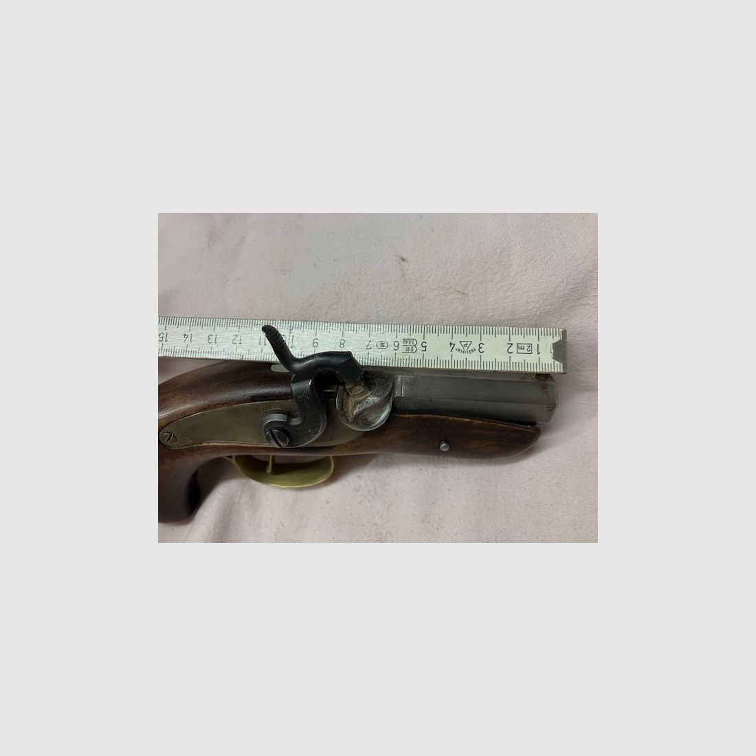 Derringer a percussione a caricamento frontale