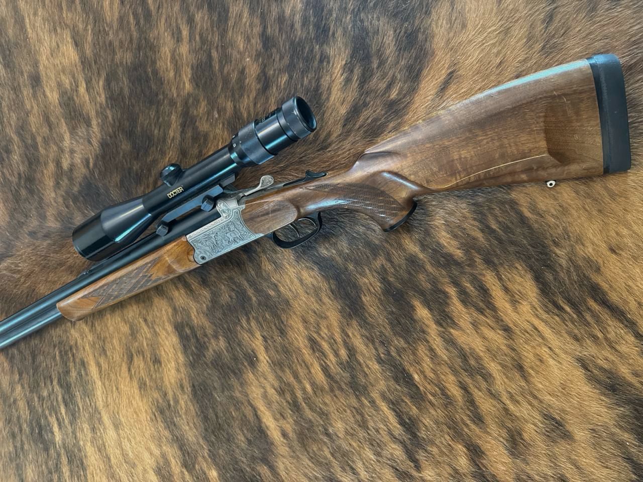 Blaser Bockbüchsflinte BBF 95, 5,6x50R Magnum + 16/70 con telescopio Docter 2,5-10x48 M