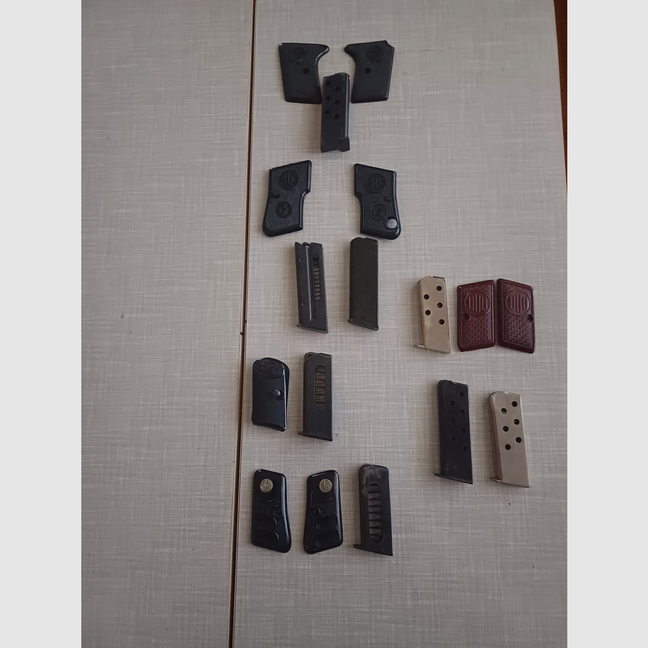 Magazine and grip panels for various 6.35mm pistols