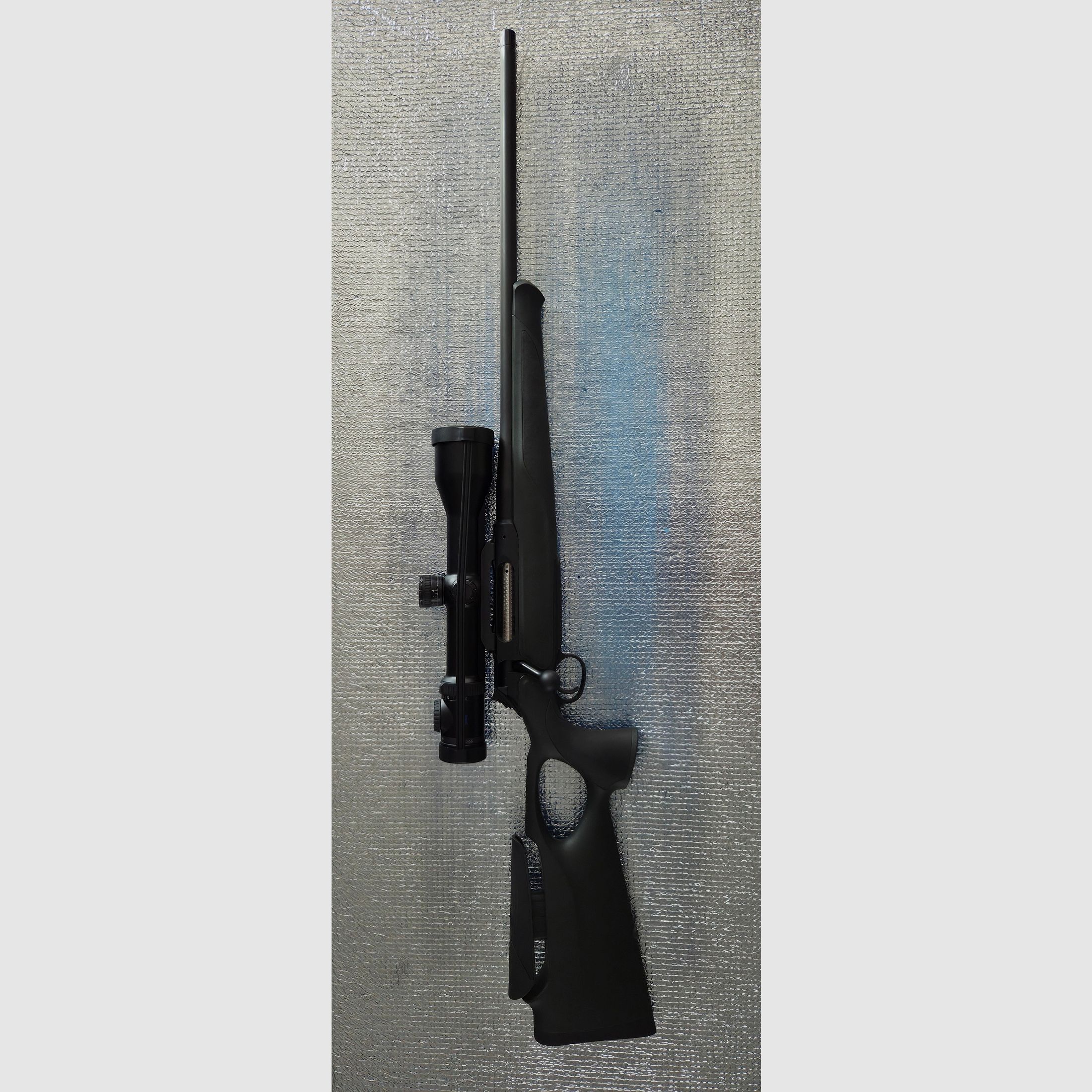 Sauer 404 Synchro XT (Sistema de acero) con mira telescópica y silenciador