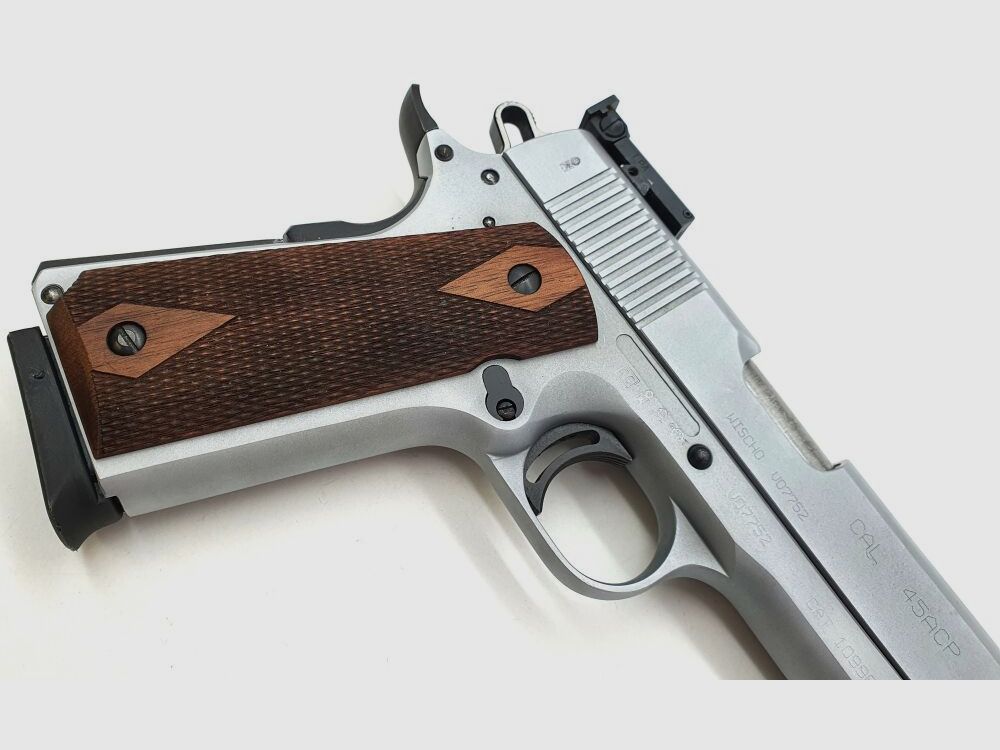 Tangfoglio Witness 1911, Usado con cargador de repuesto