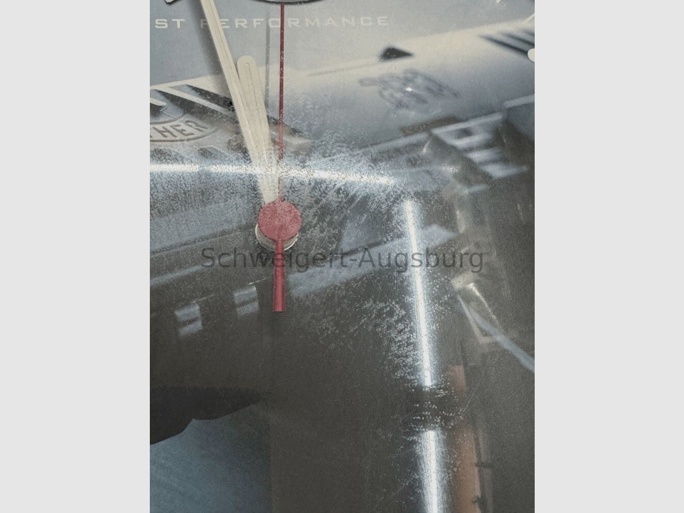 125 años de reloj de pared Walther con funda protectora