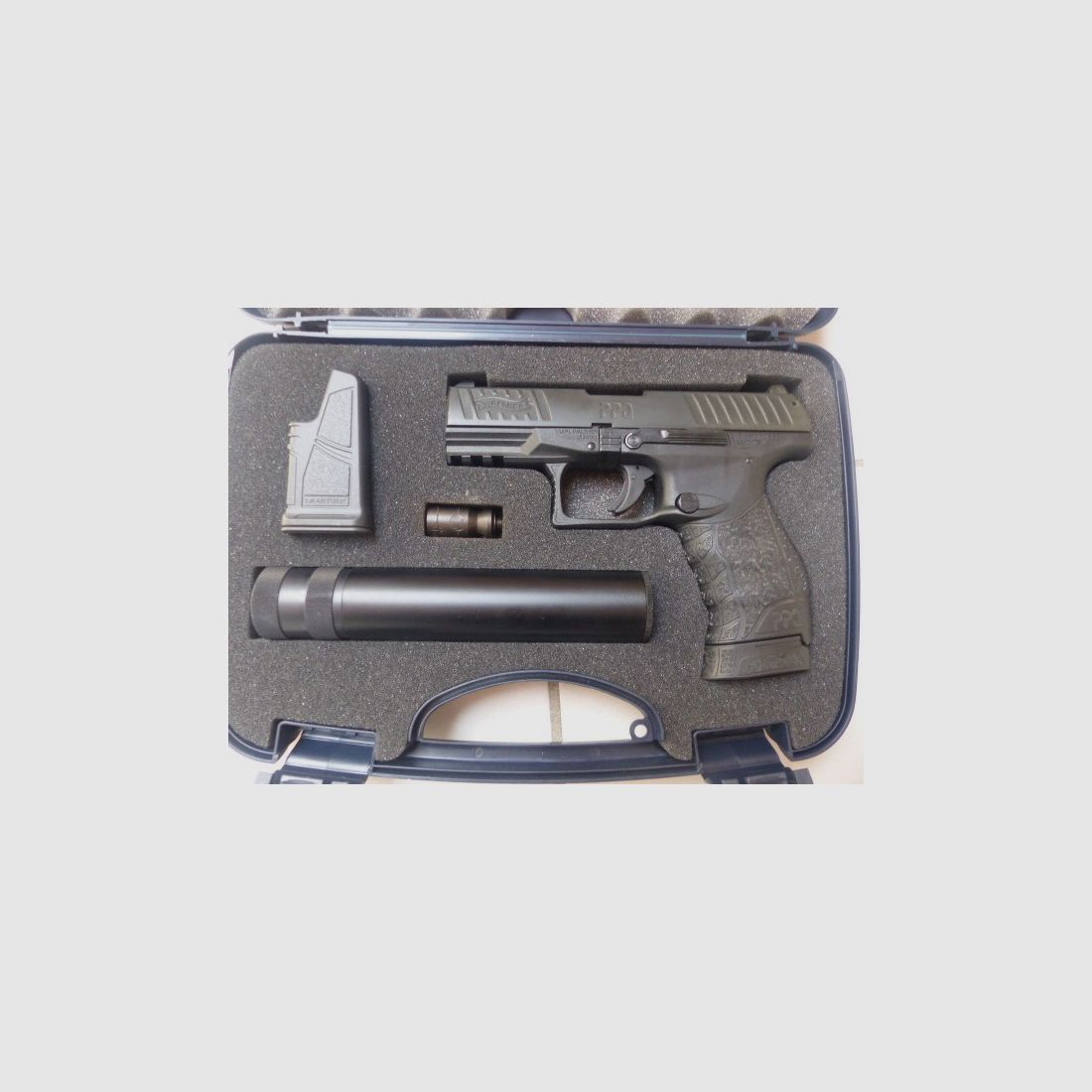 Walther PPQ Navy Kit with suppressor, blank firing adapter, loading aid, case. Only 2 shots fired