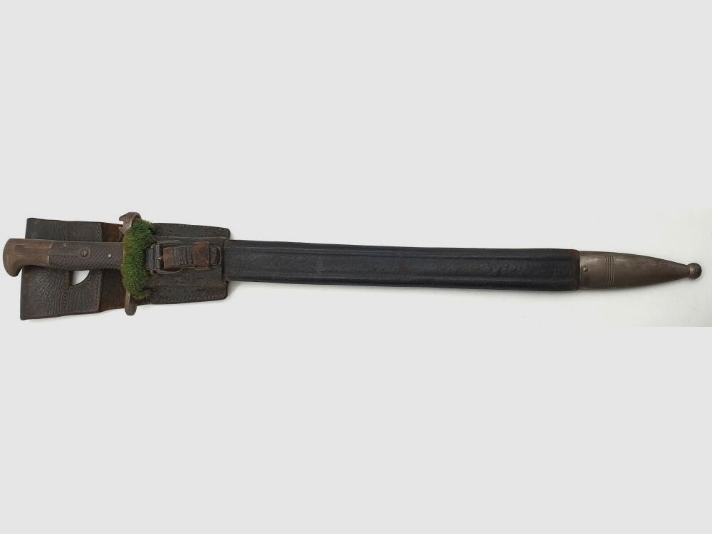 Vetterli original Vetterli bayonet with saw teeth and green fur on the scabbard