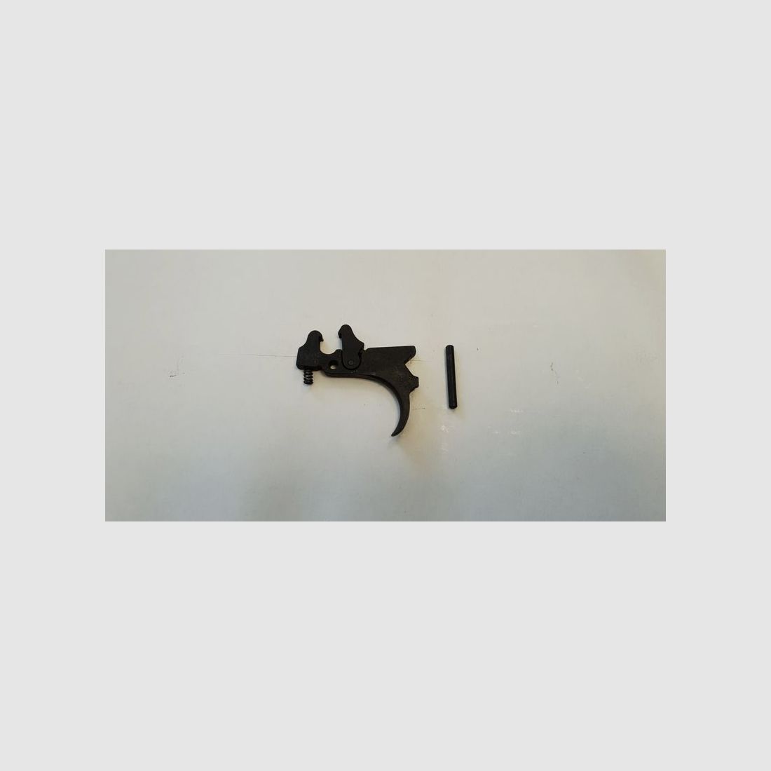 Grilletto + asse e molla BENELLI M121, immagine 1 di 2