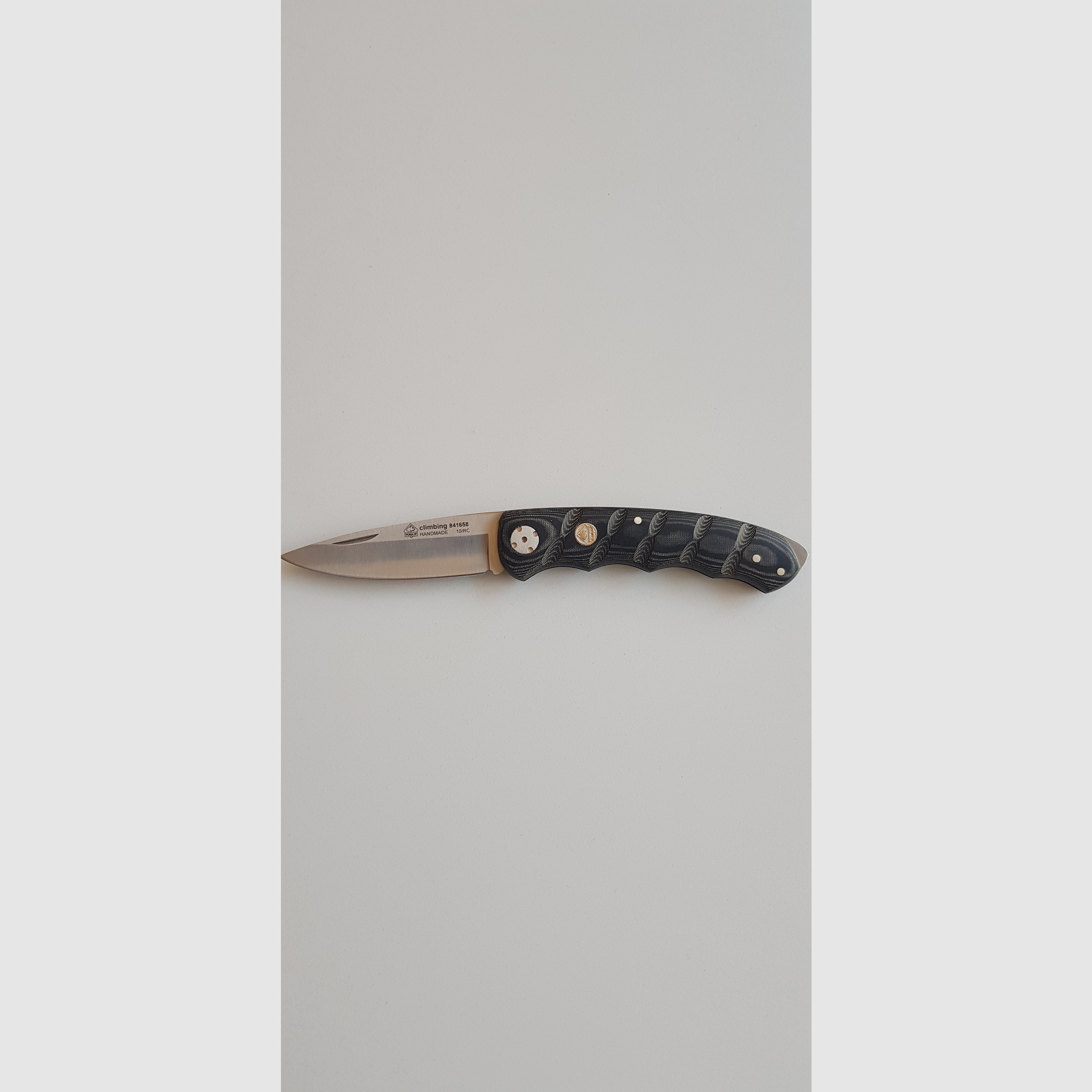 Puma IP climbing micarta