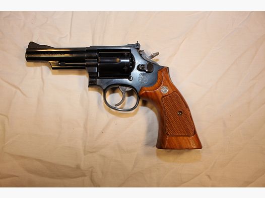 S&W Model 19, .357 Mag., 64 inches.