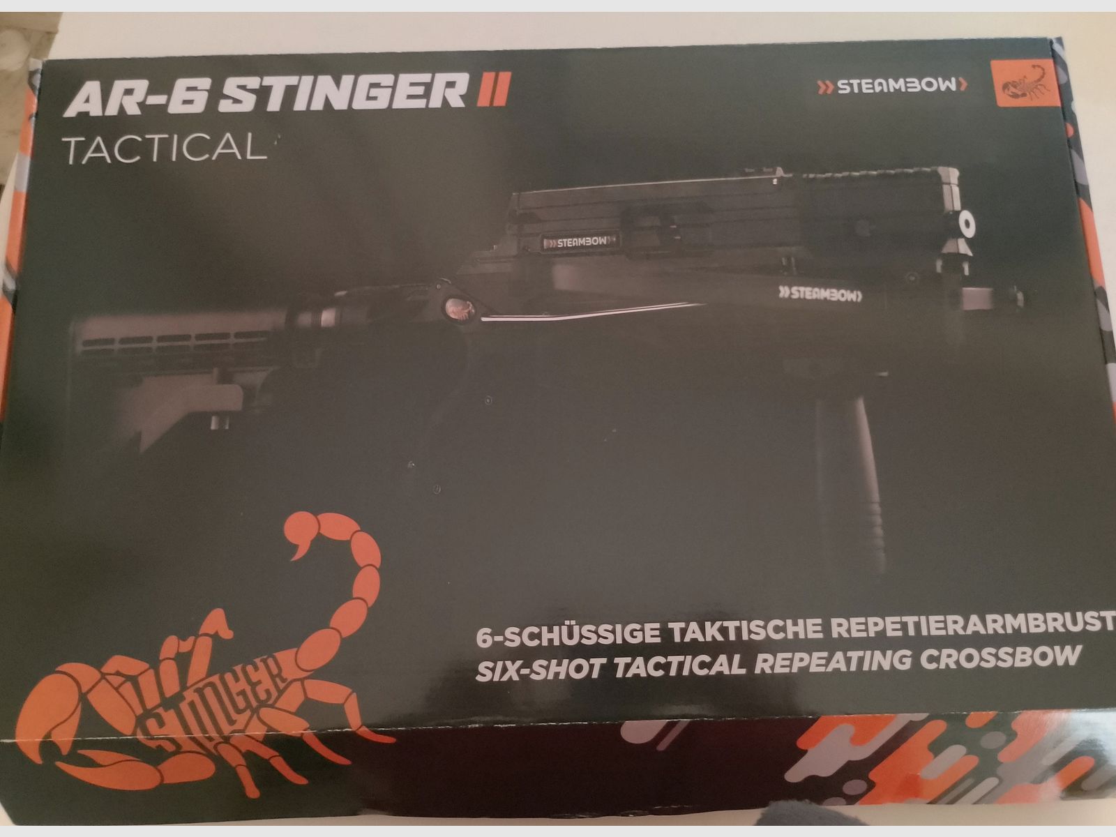 Balestra a pistola multicolpo Steambow AR-6 Stinger II Tactical 55 lbs, caricatore da 6 colpi, 130 dardi e red dot, immagine 2 di 5