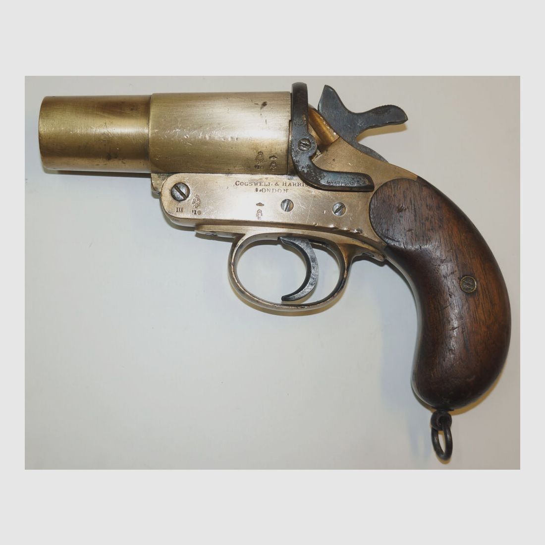 Cogswell & Harrison flare gun, Cogswell & Harrison, brass barrel and housing, small defect (spring break)