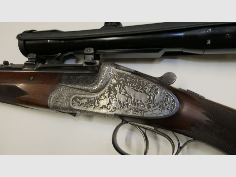 Merkel E313 mit jagdlichen Tiergravuren
