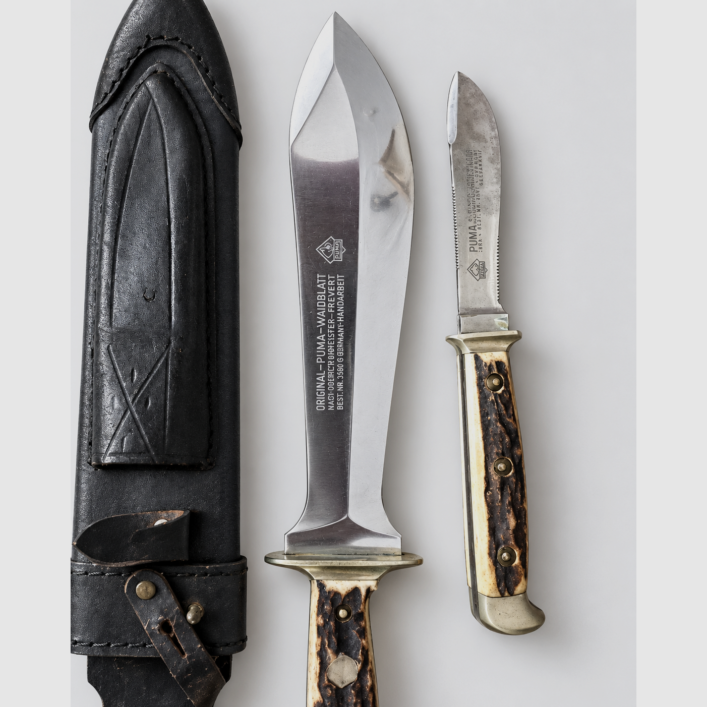 Original PUMA Waidbesteck nach Frevert 3588/3587 – Waidblatt + Jagdnicker + Lederscheide, Bild 1 von 4