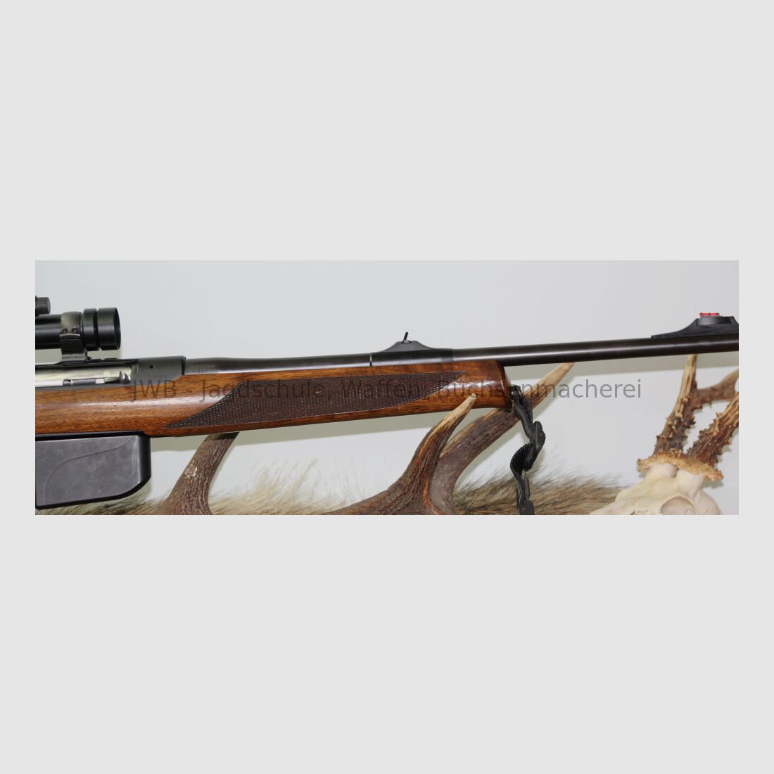 Sauer 303 mit Aimpoint 5000 303 Classic