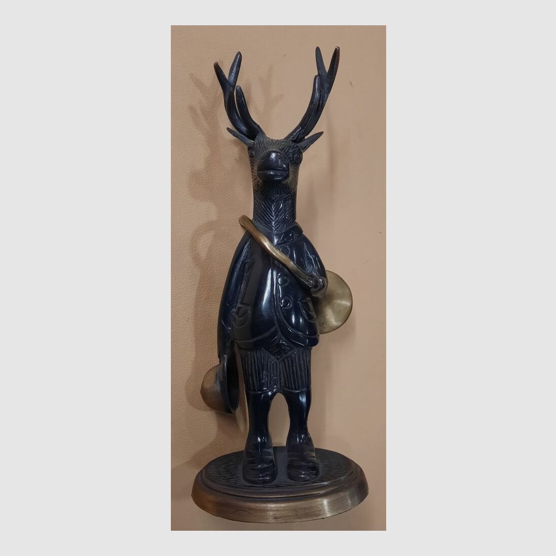 Deer figure with hunting horn bronze figure