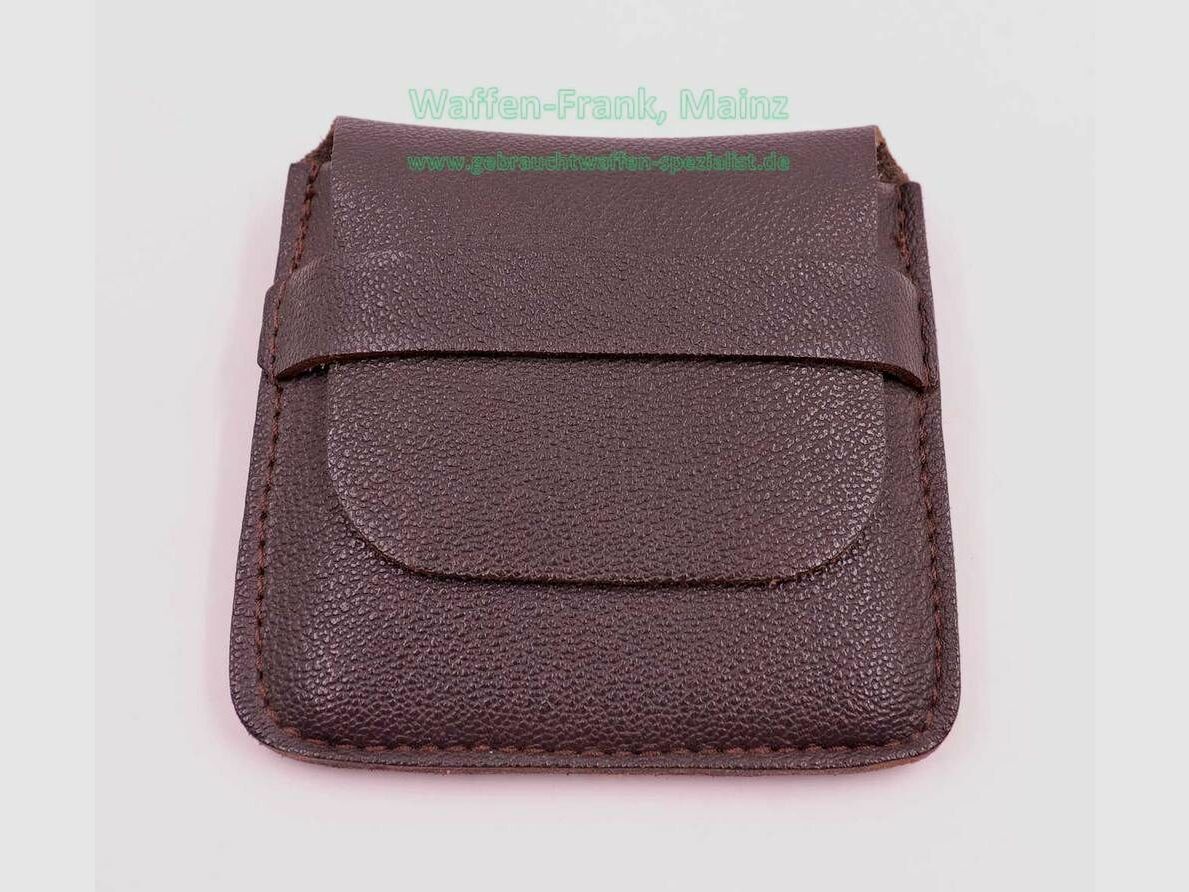 Manufacturer unknown cartridge case, grained leather