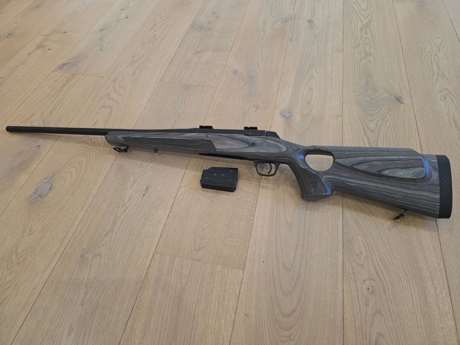 Winchester XPR repeating rifle in .308 with Steiner Ranger scope and silencer