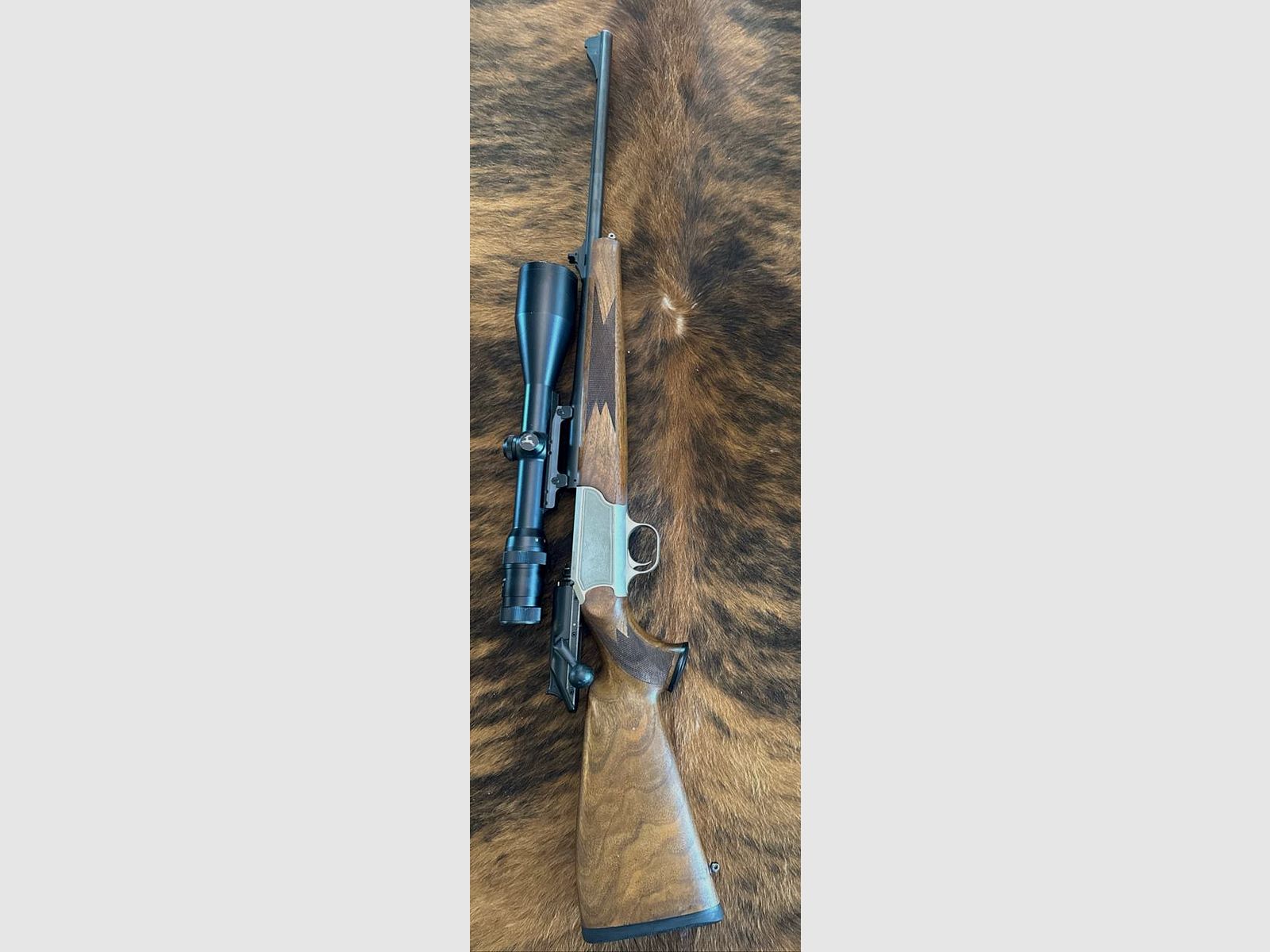 Blaser R93 straight pull repeater caliber .30-06 with original Blaser saddle mount and target optics Frankonia 3–12×56, reticle 4