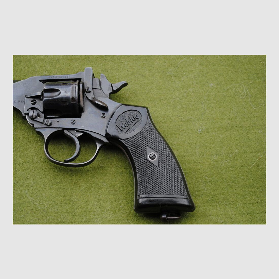 Webley MARK IV, various British stamps