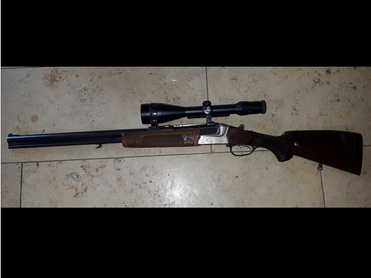 Fusil à deux coups Krieghoff Teck avec lunette.