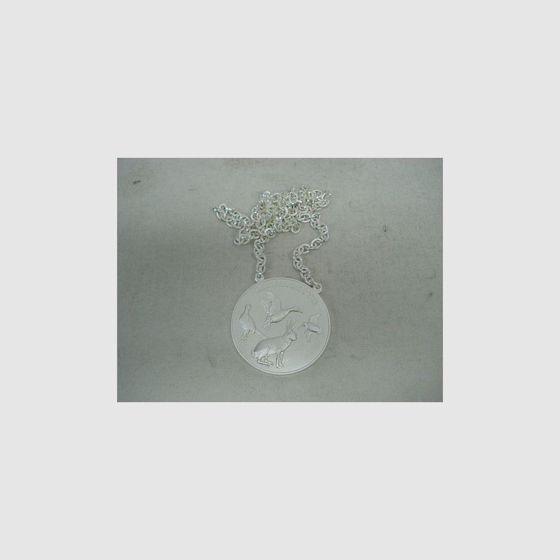 Hunting med. Small game silver-plated - 60 mm, ring and eyelet