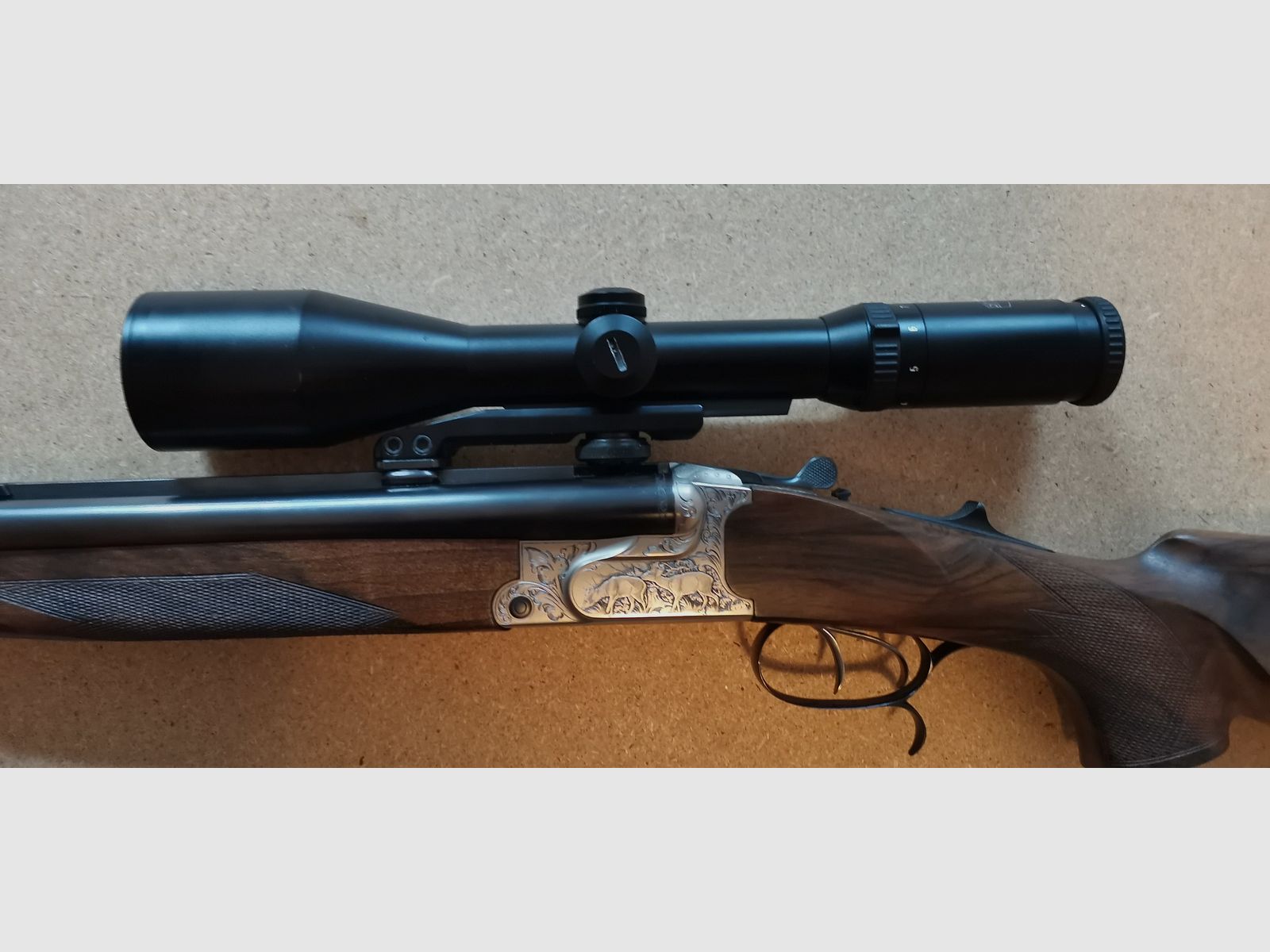 Boring Krieghoff Plus 20, 9,3 x 74R, 20/76 met EL 65, 5,6x 52R, handspanner, S&B LP 3-12 x 50