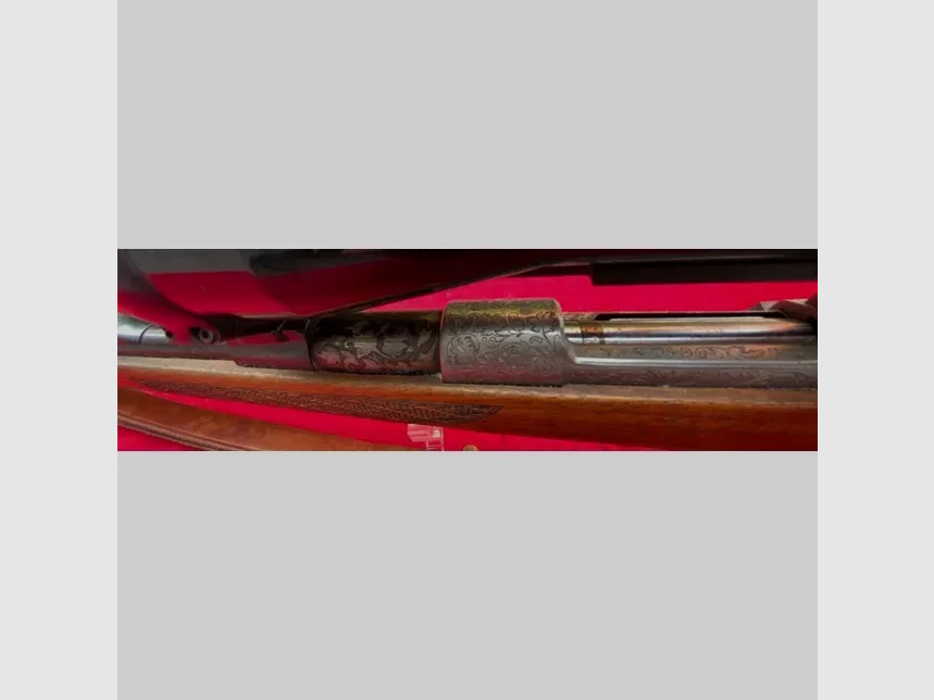 Mauser Modell 98 Cal. 300 WinMag mit sehr schönen Silbereinlagen und tiefen Gravuren 