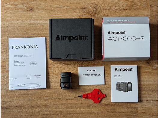 Two months old Aimpoint ACRO C-2 with receipt