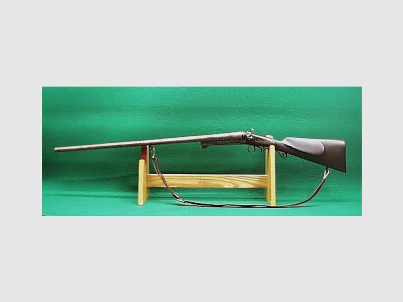 Double-barrel shotgun with spoon lock