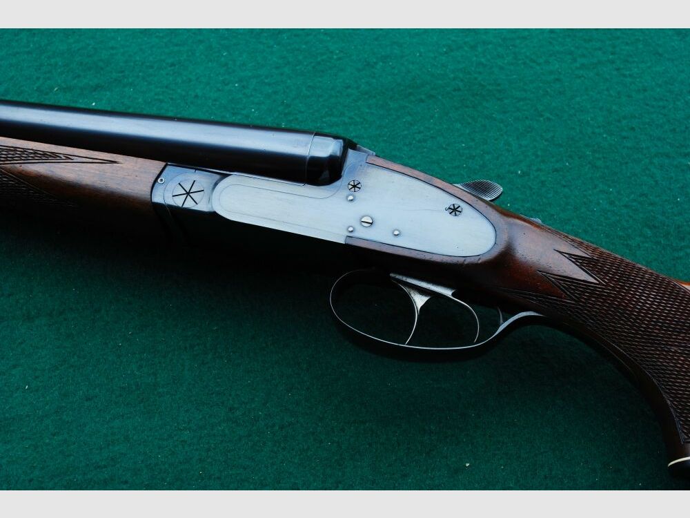 CAS escopeta de caza, auténticos cerrojos laterales, sin extractores, seguro manual.