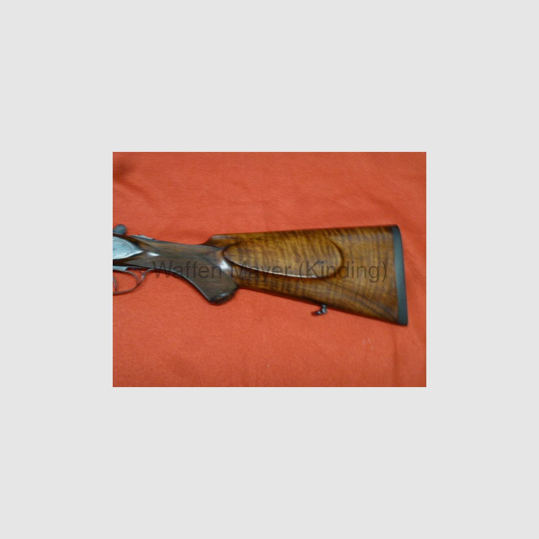 Escopeta doble con cerradura lateral Suhler