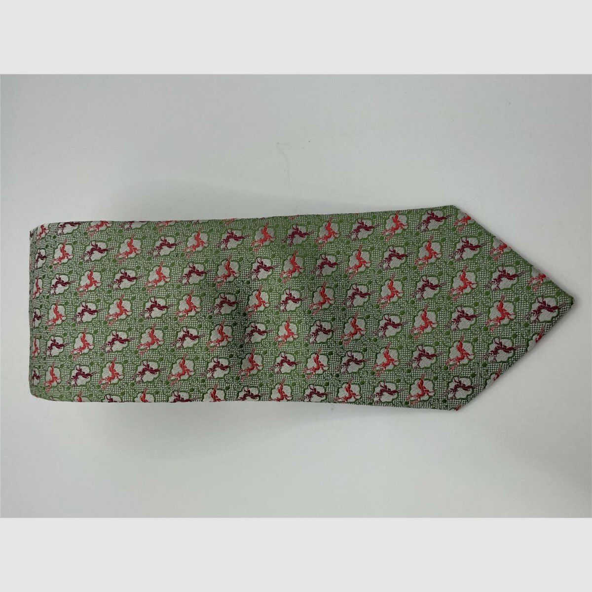 Cravatta verde con motivi a pois bianchi, rosa e viola con cervo