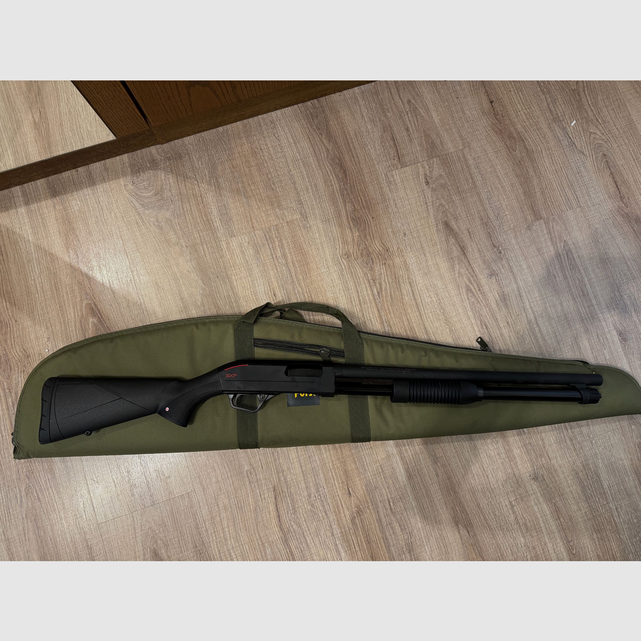 Winchester SXP Defender High Capacity 12/76