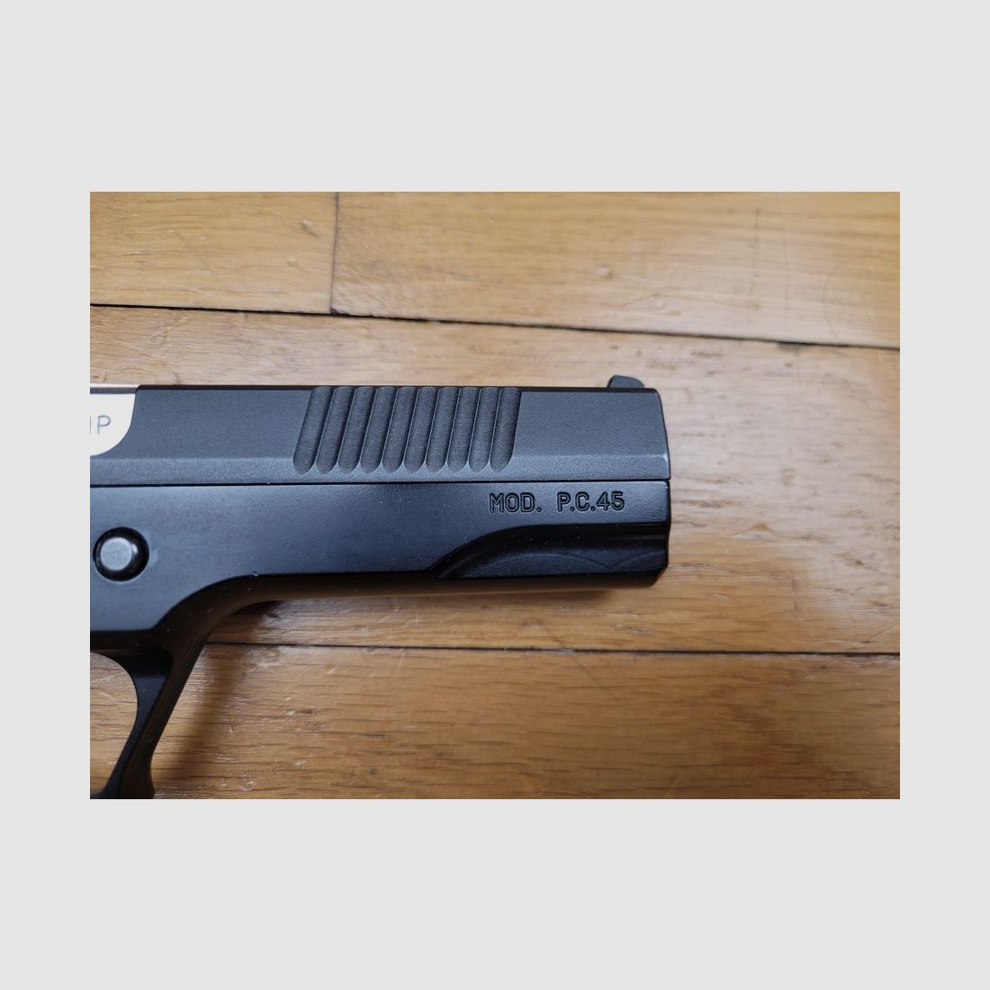Sehr schöner Pardini GT45 Pistol – 45 ACP – Top-Aluminium-Gehäuse – 13-Schuss-Doppelmagazin – Alle Bedienelemente für Links- und Rechtshänder – Niedrig zugänglicher Verschlussfang – Petter-Verriegelung – Schräger Schaft im Luger-Stil – Luxus und Sport – Neuwertig, Bild 20 von 20