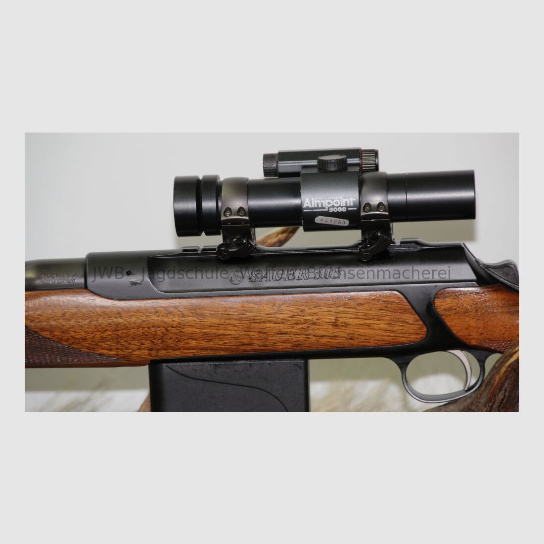 Sauer 303 mit Aimpoint 5000 303 Classic