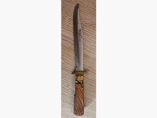 Coltello a serramanico leopardato antico